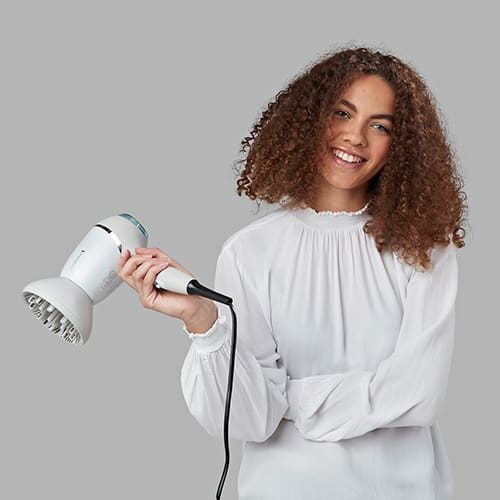 AW20-EC9001-Hydraluxe-Pro-Hairdryer-Lifestyle-In-Hand3